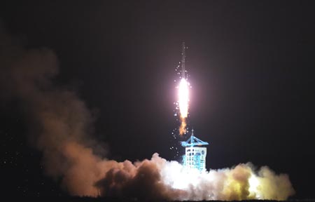 The launch of the Yaogan-25 remote sensing satellite in Jiuquan, Dec. 11. (Photo/Xinhua)