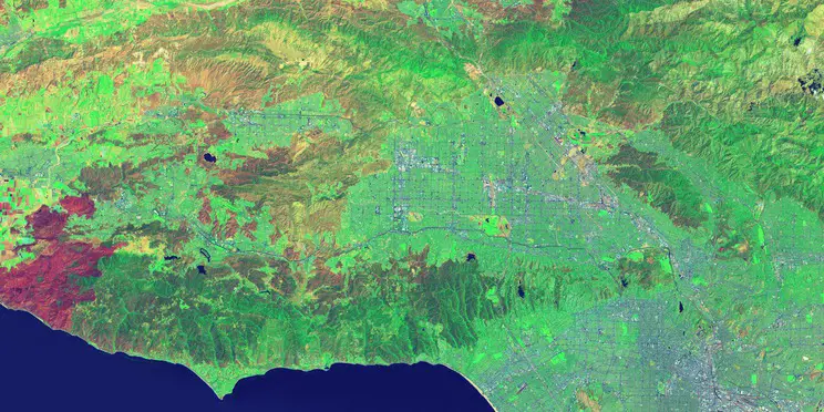 False-color image by using SWIR as red, NIR as green, and deep blue as blue of Landsat 8 satellite.   Credit: USGS