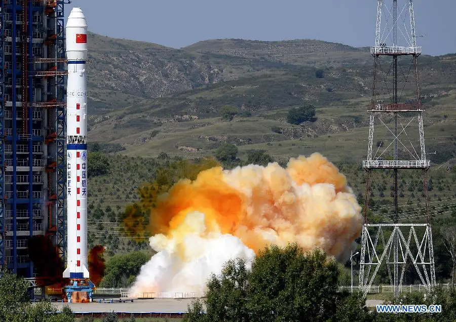 A Long March-4C rocket carrying the Yaogan-27 remote sensing satellite blasts off from the launch pad at the Taiyuan Satellite Launch Center in Taiyuan, capital of north China's Shanxi Province, Aug. 27, 2015. The satellite will mainly be used for experiments, land surveys, crop yield estimates and disaster prevention. [photo:Xinhua/Yan Yan] 