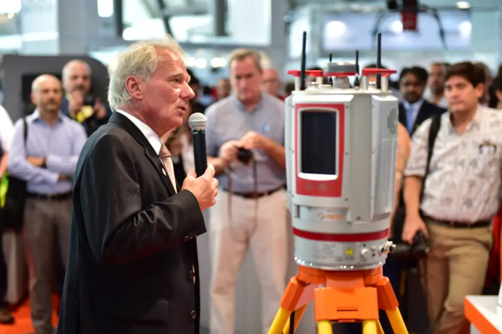 Attracting a lot of attention: Dr. Riegl, CEO, unveiling new RIEGL VZ-400i 3D Terrestrial Laser Scanner at the RIEGL Intergeo booth in Stuttgart