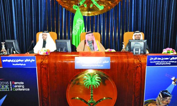 KACST President Prince Turki bin Saud bin Mohammed Al-Saud, center, is flanked by chairman of the scientific committee of the conference Mohamed Al-Farhan, right , and Saad Al-Hamlan from the General Commission of Survey at the conference. Credit: Arab News