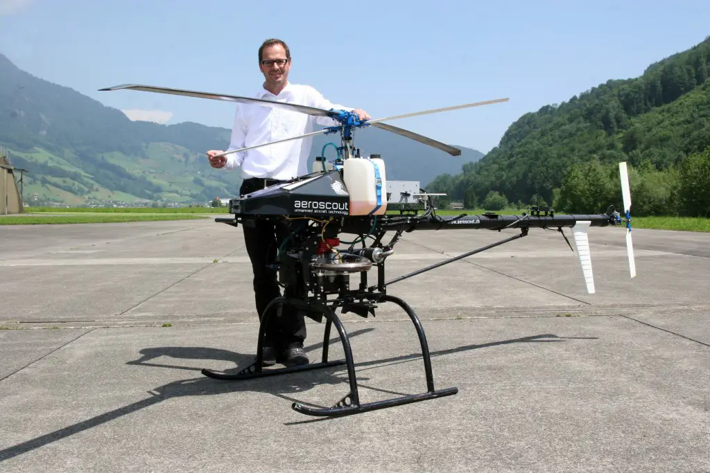 Dr. Christoph Eck, Aeroscout CEO, with their Scout UAV Helicopter