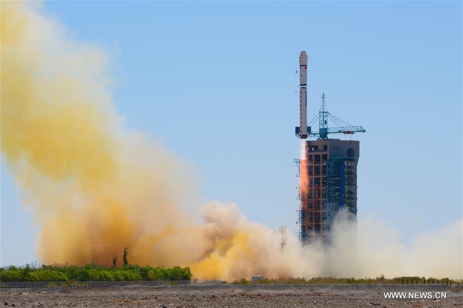 A Long March 2-D rocket carrying the Yaogan-30 remote sensing satellite blasts off.