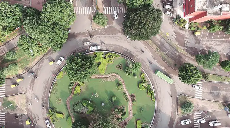 The estate officials carry out an aerial survey of properties – commercial and residential – in Sector 7, Chandigarh using drone. Credit: The Indian Express