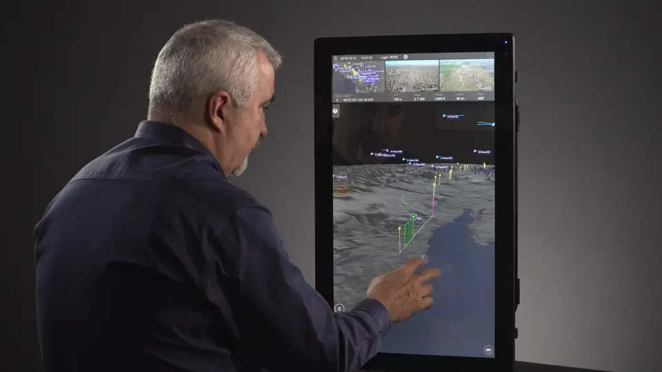 Program director Paige Cutland uses IRIS UAS software. The best-in-class IRIS UAS situational awareness display will include airspace safety and efficiency services powered by the AirMap airspace management platform