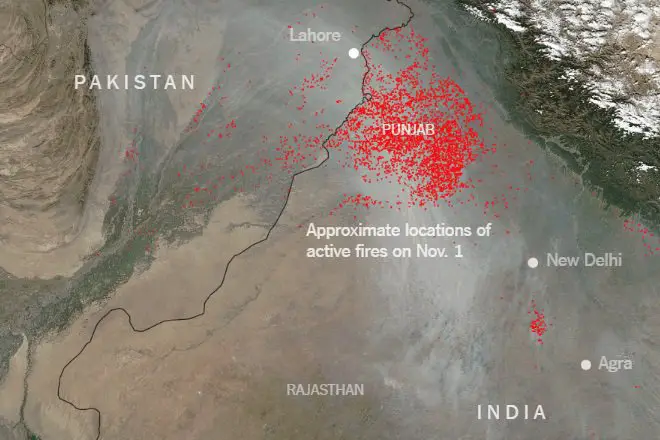 Crop Residue Burning -Farmers in neighboring Punjab and Haryana have been setting fire to paddy stubble in their fields. Credit: Financial Express