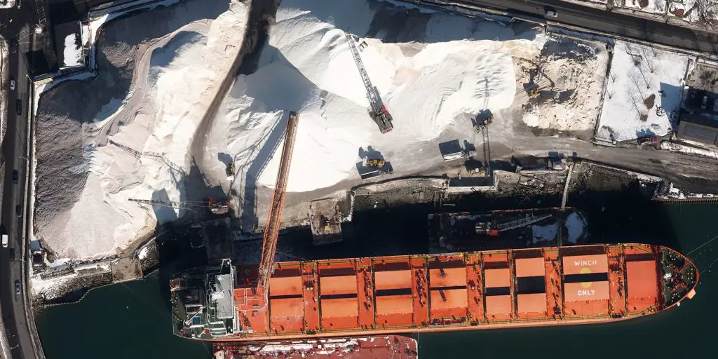 Aerial Imagery -Aerial image of salt being unloaded from ship at the Chelsea Docks in New York Harbor.